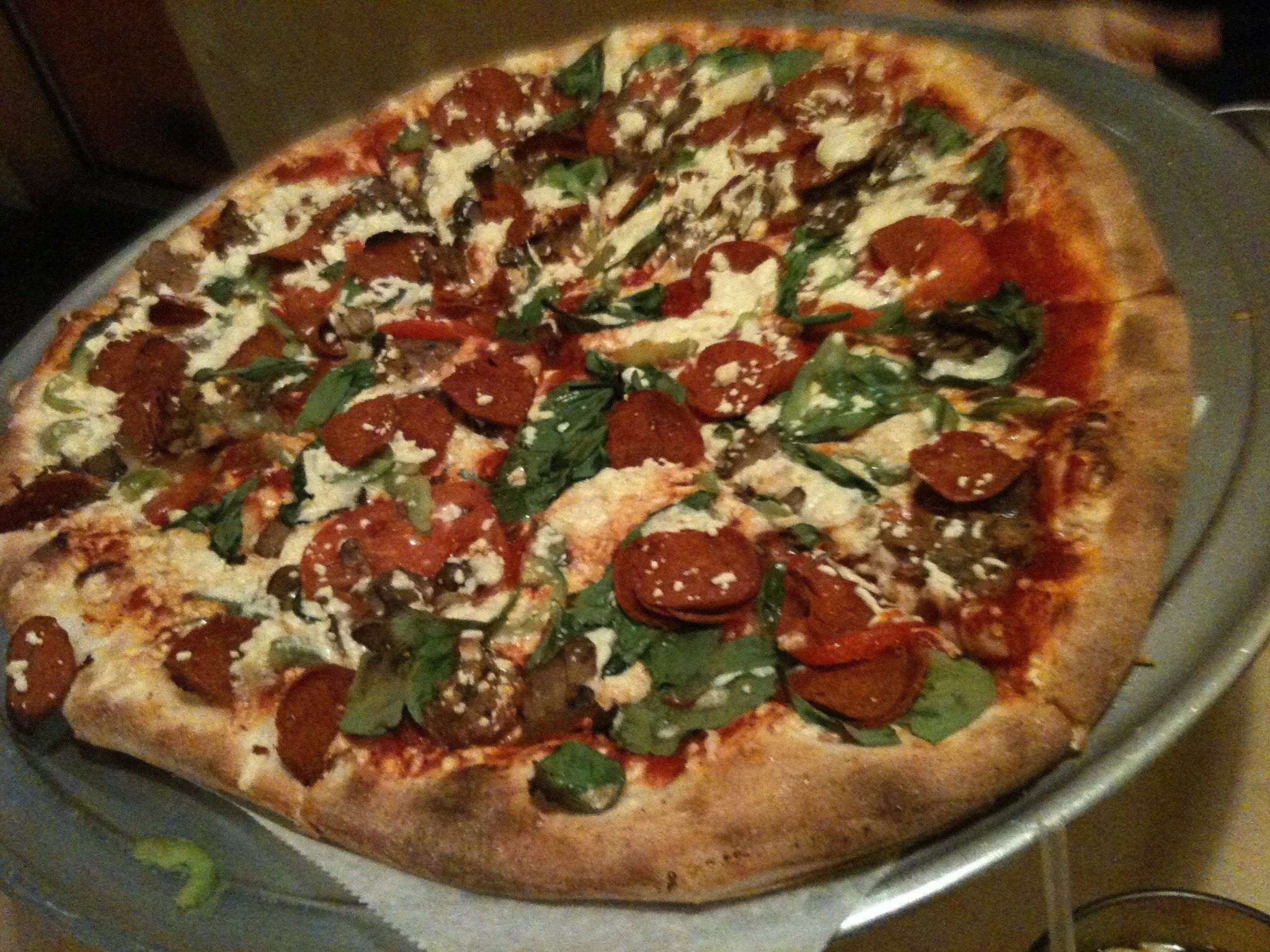 a small pizza sitting on top of a pan