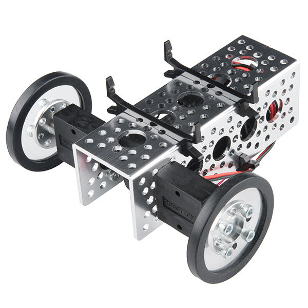 a small metal buggy that has wheels and small parts attached