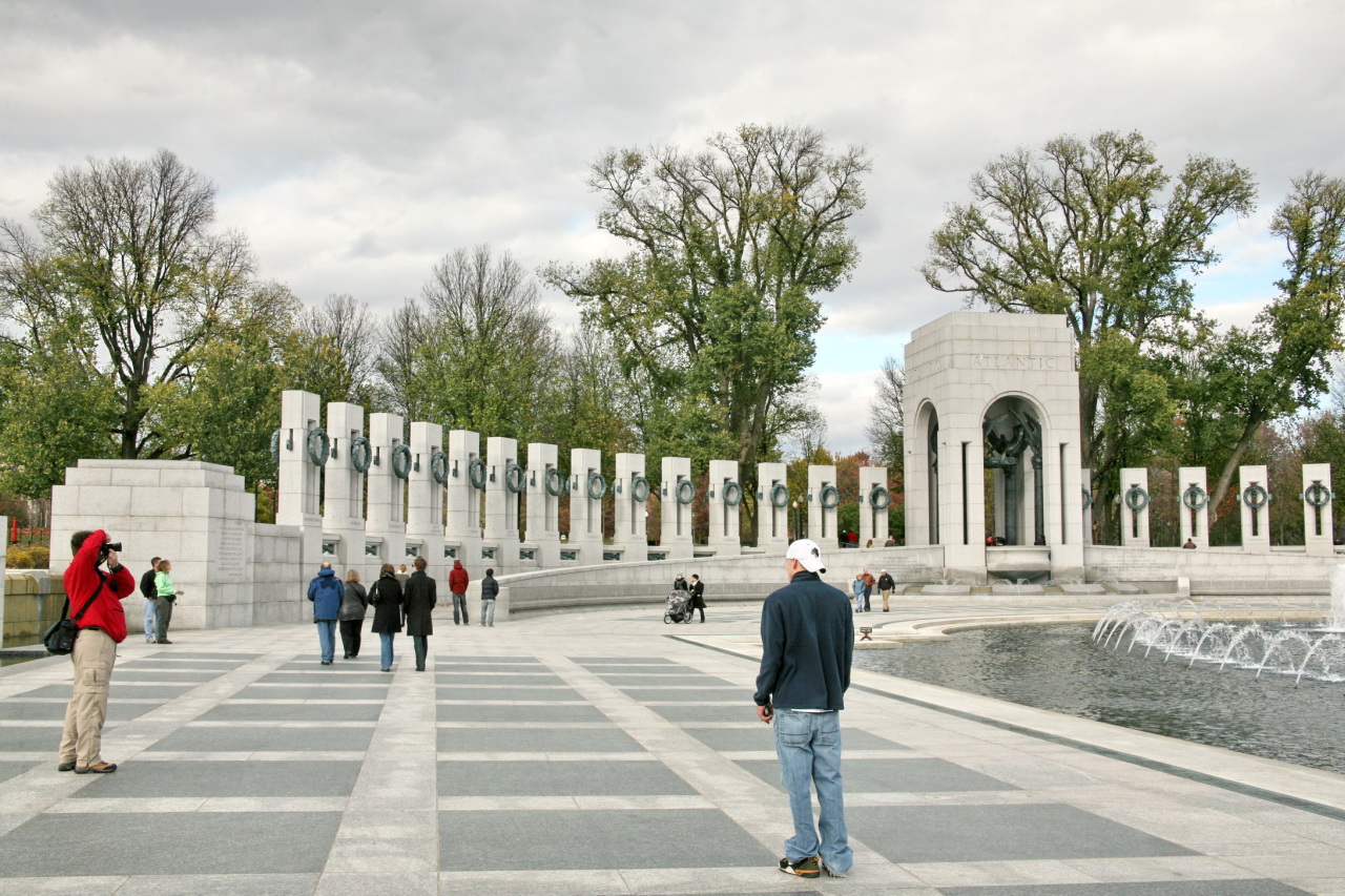 people standing in front of the national memorial