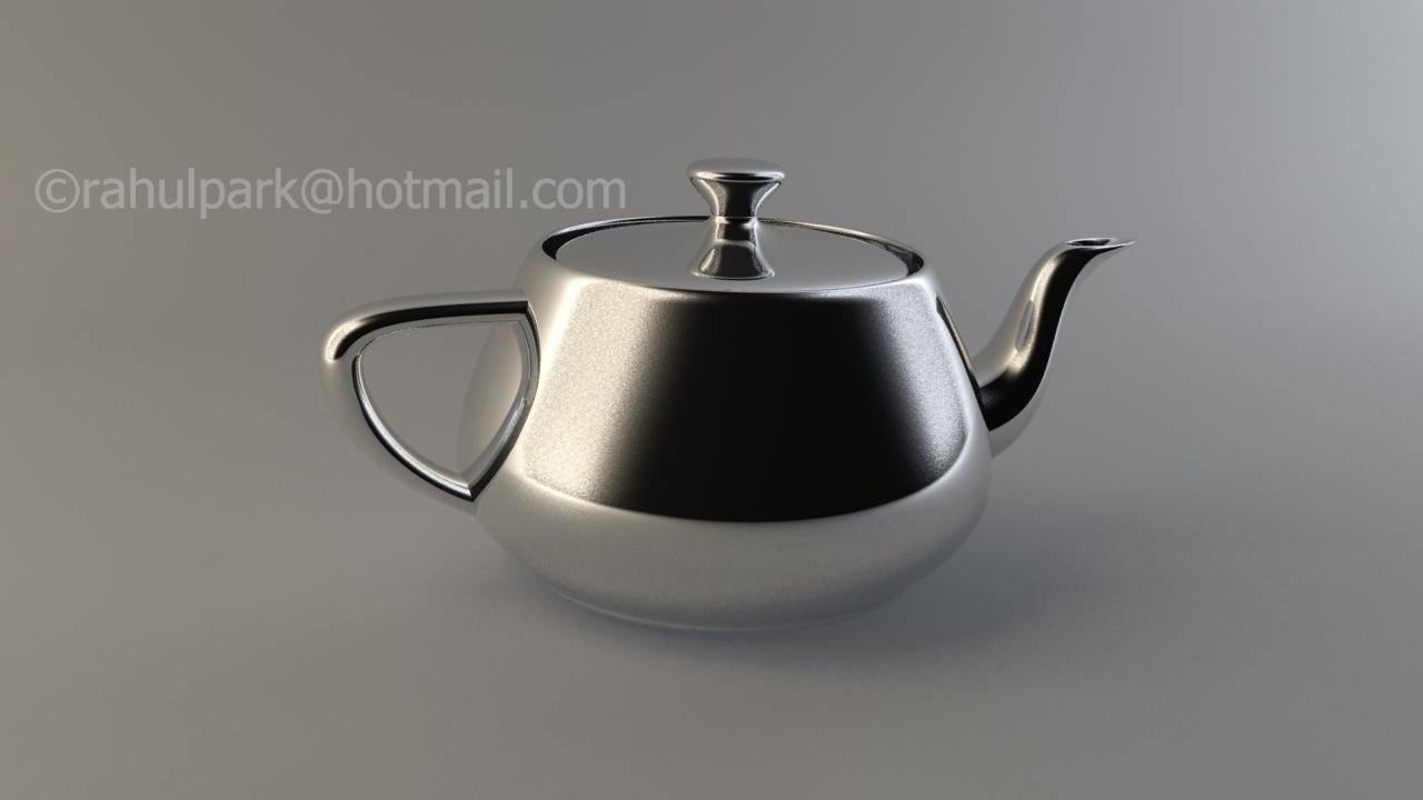 this is a teapot with a metal handle