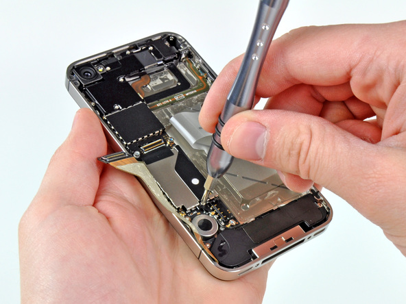 someone is working on an iphone with one hand and the other