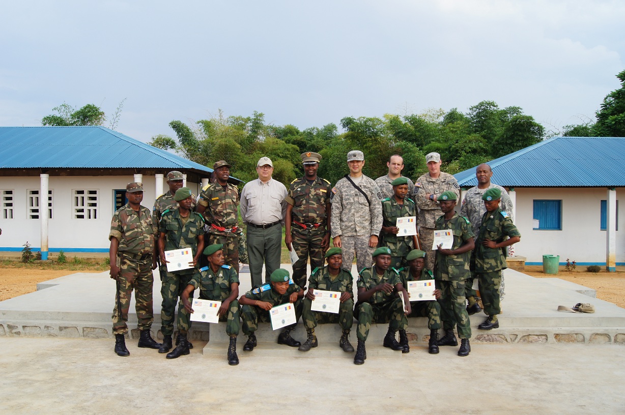 a group of soldiers pose for a po together