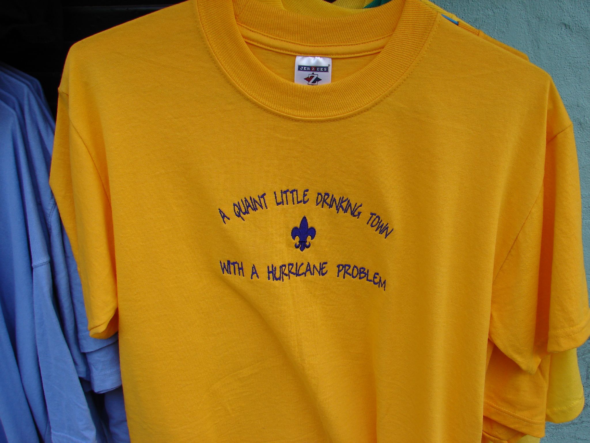 t - shirt with a blue and yellow one on it