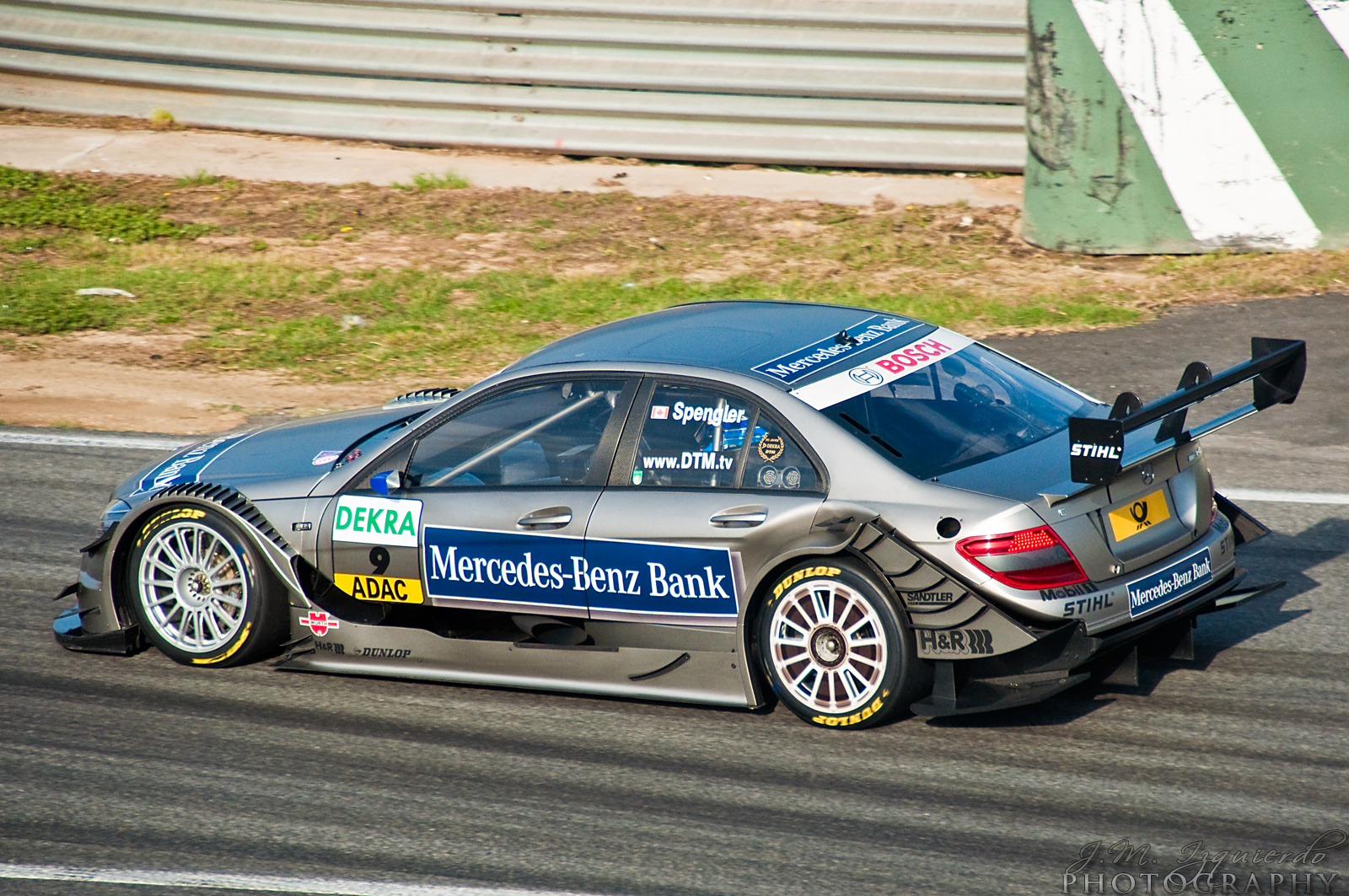 a person riding in a car on a track