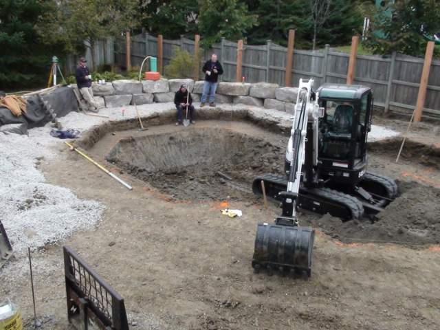 a bulldozer is parked in an underground pit
