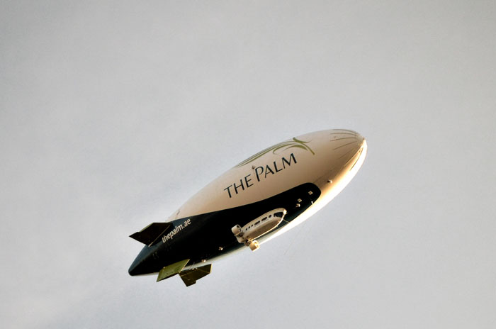 an airplane with the words the palm in english writing