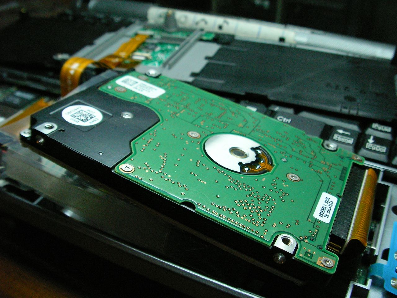 the hard drive tray is being dismantled