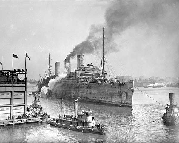 an old po of a large ship in the water