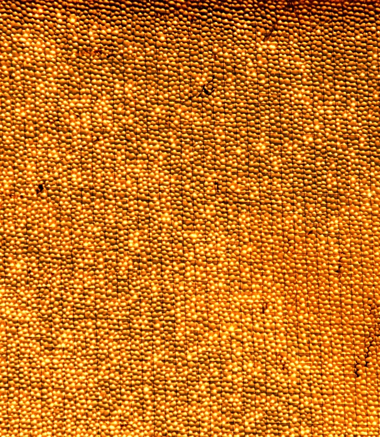 a close up view of the grained surface of a fabric