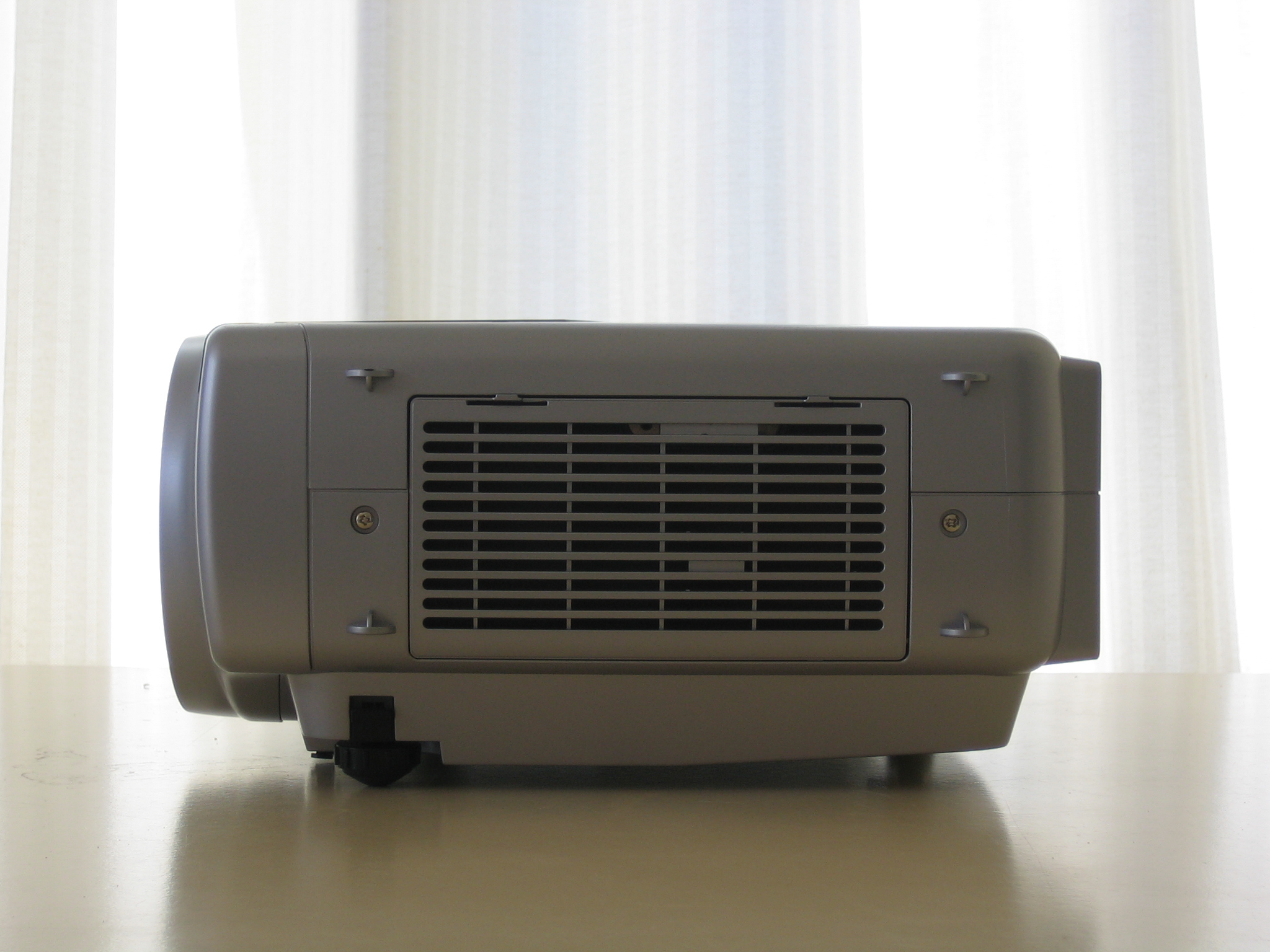 a small white fan on top of a table