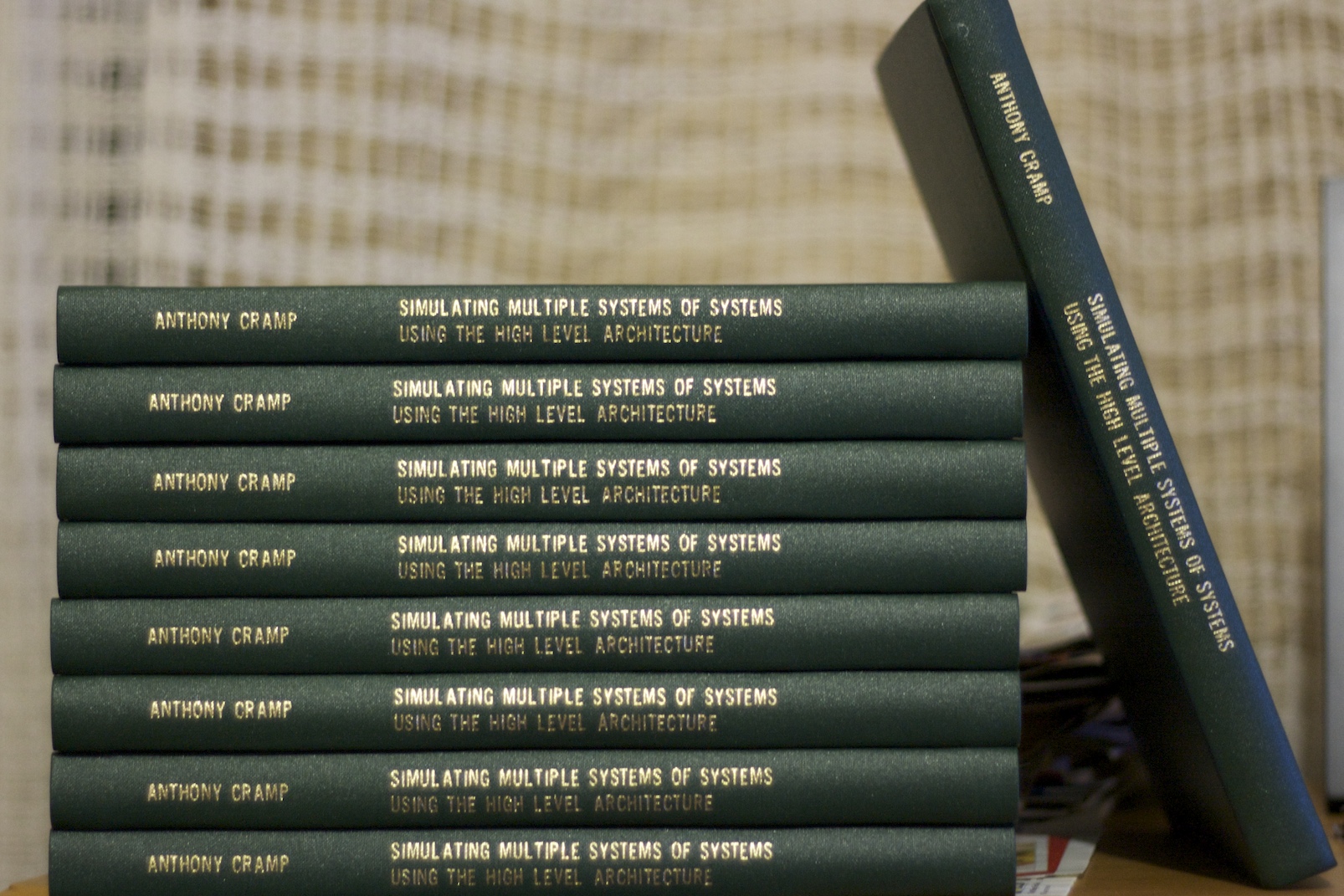 a stack of law books with gold lettering