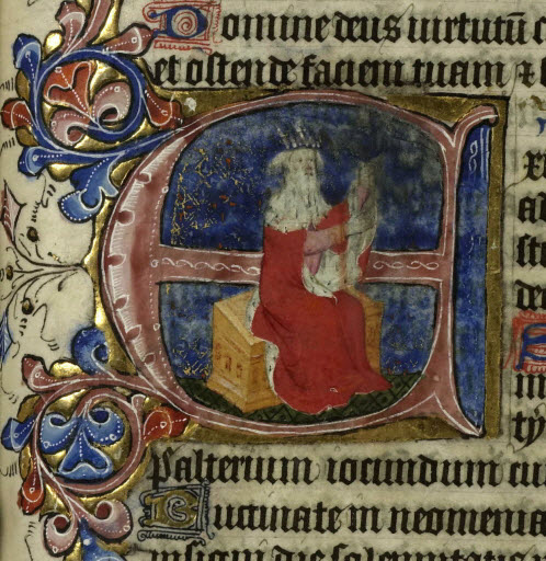 a medieval book with an image of a man and woman