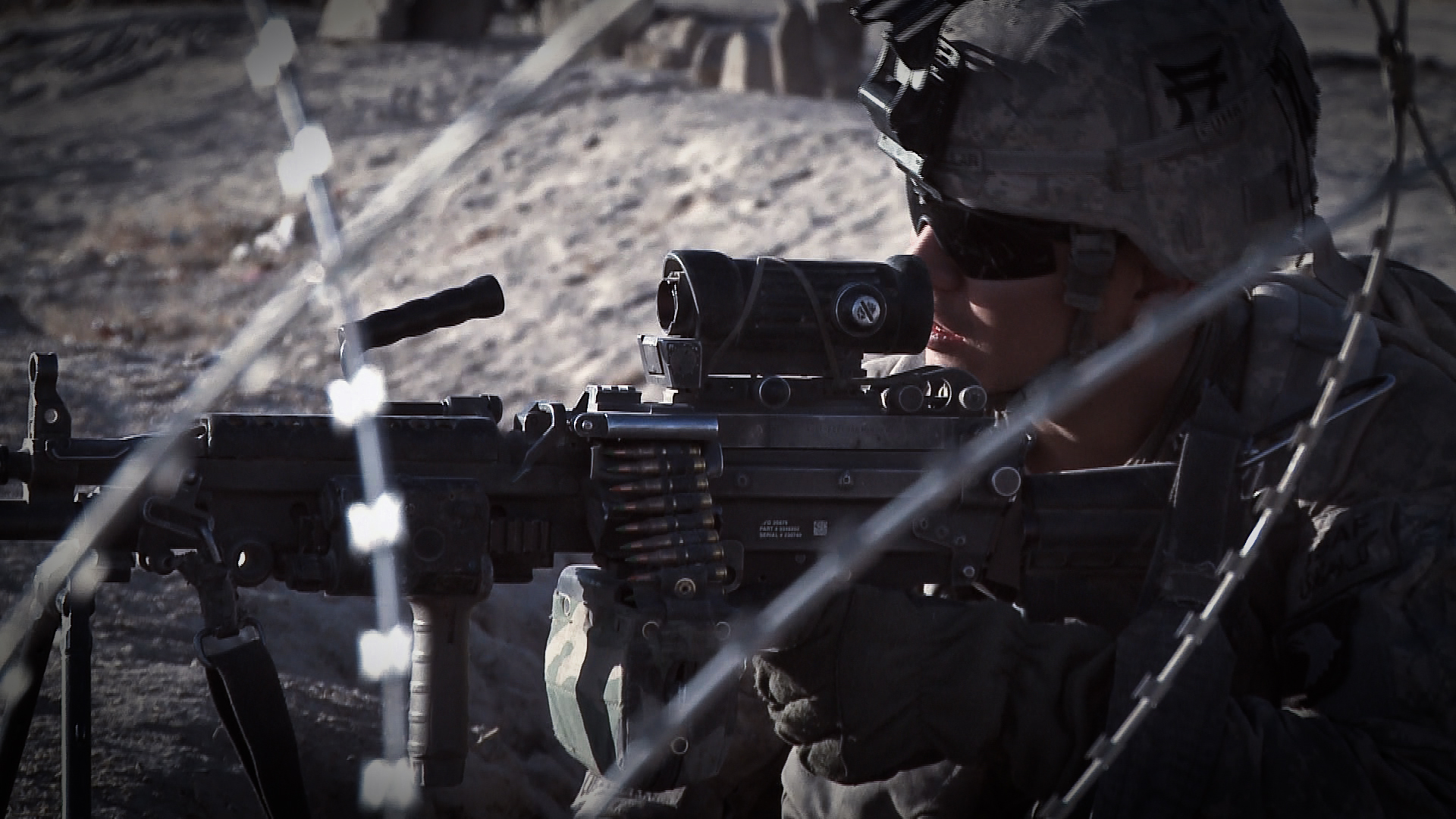 a soldier holding an m14 with a rifle