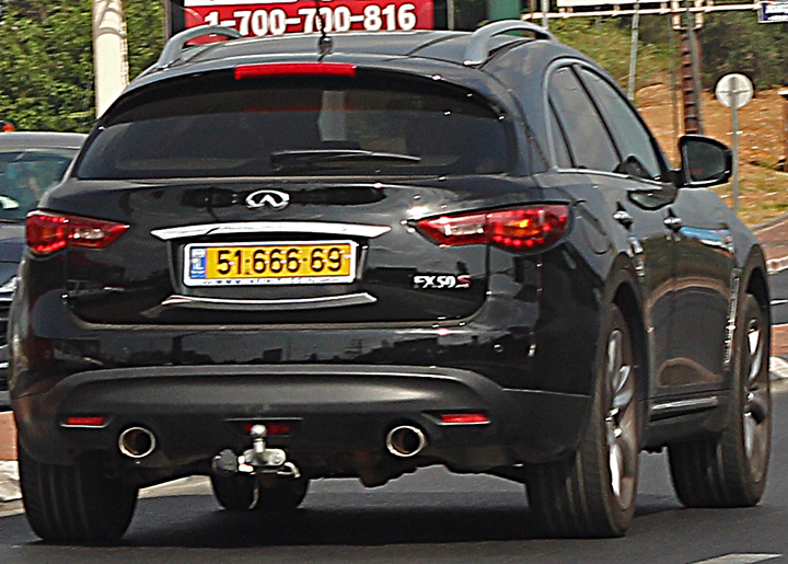 an infinitat for the rear view mirror on a black car