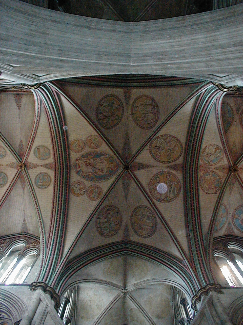 the ceiling in the cathedral is painted with several images