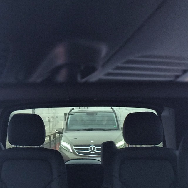 looking out of the rear view window of a vehicle