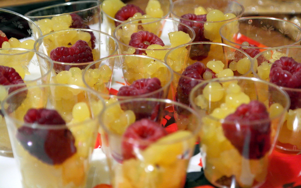 glasses with fruits arranged on a tray
