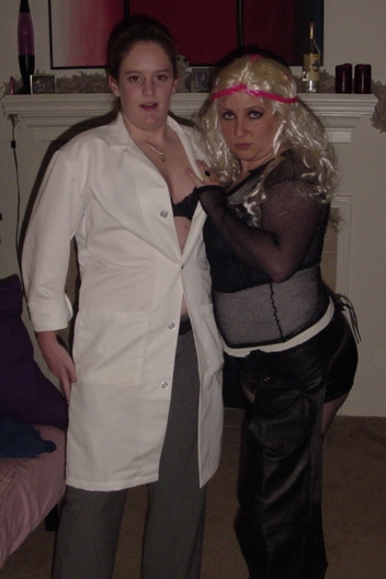 two people in costume pose for the camera