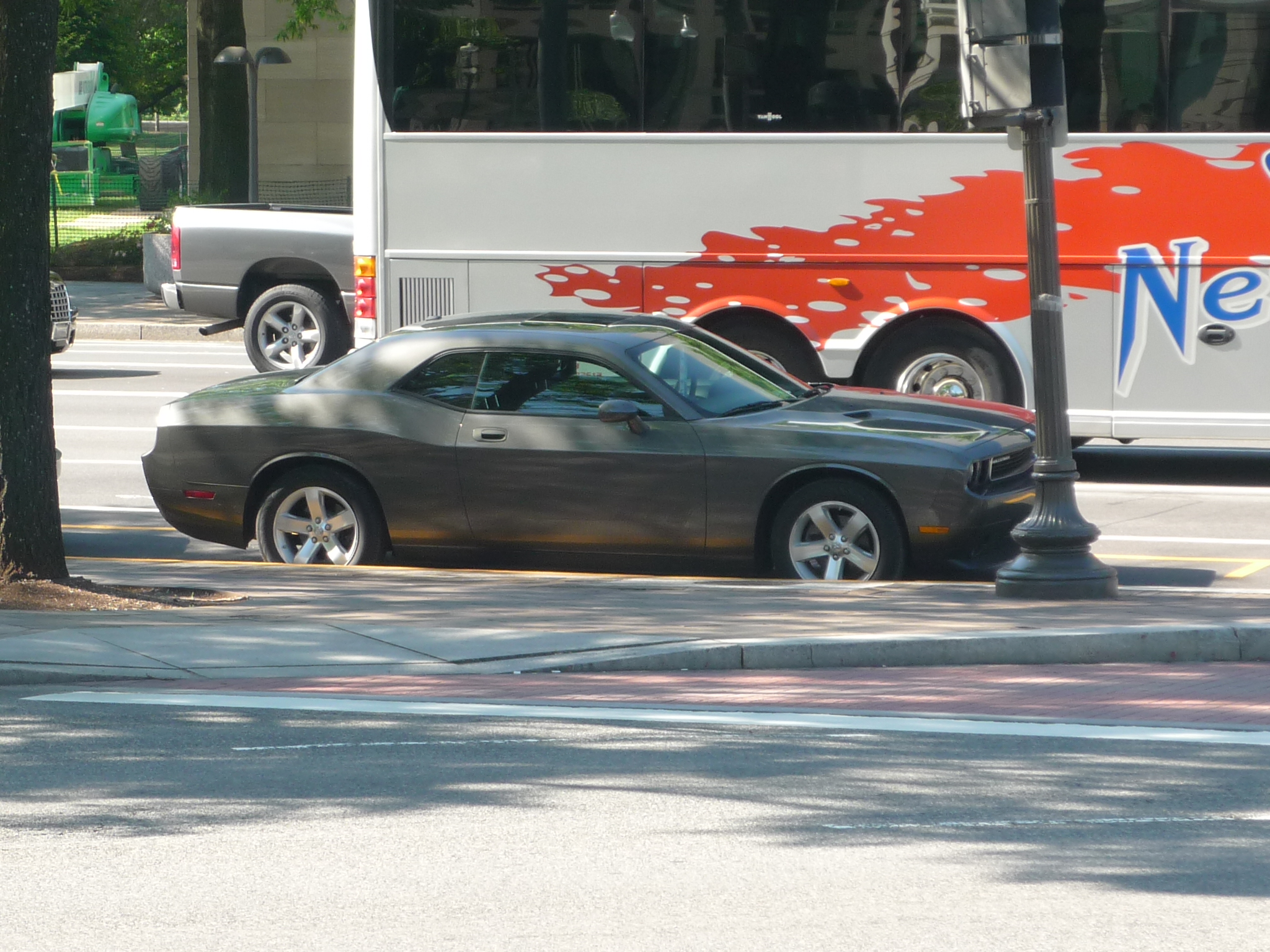 a dodge charger parked on the side of the road