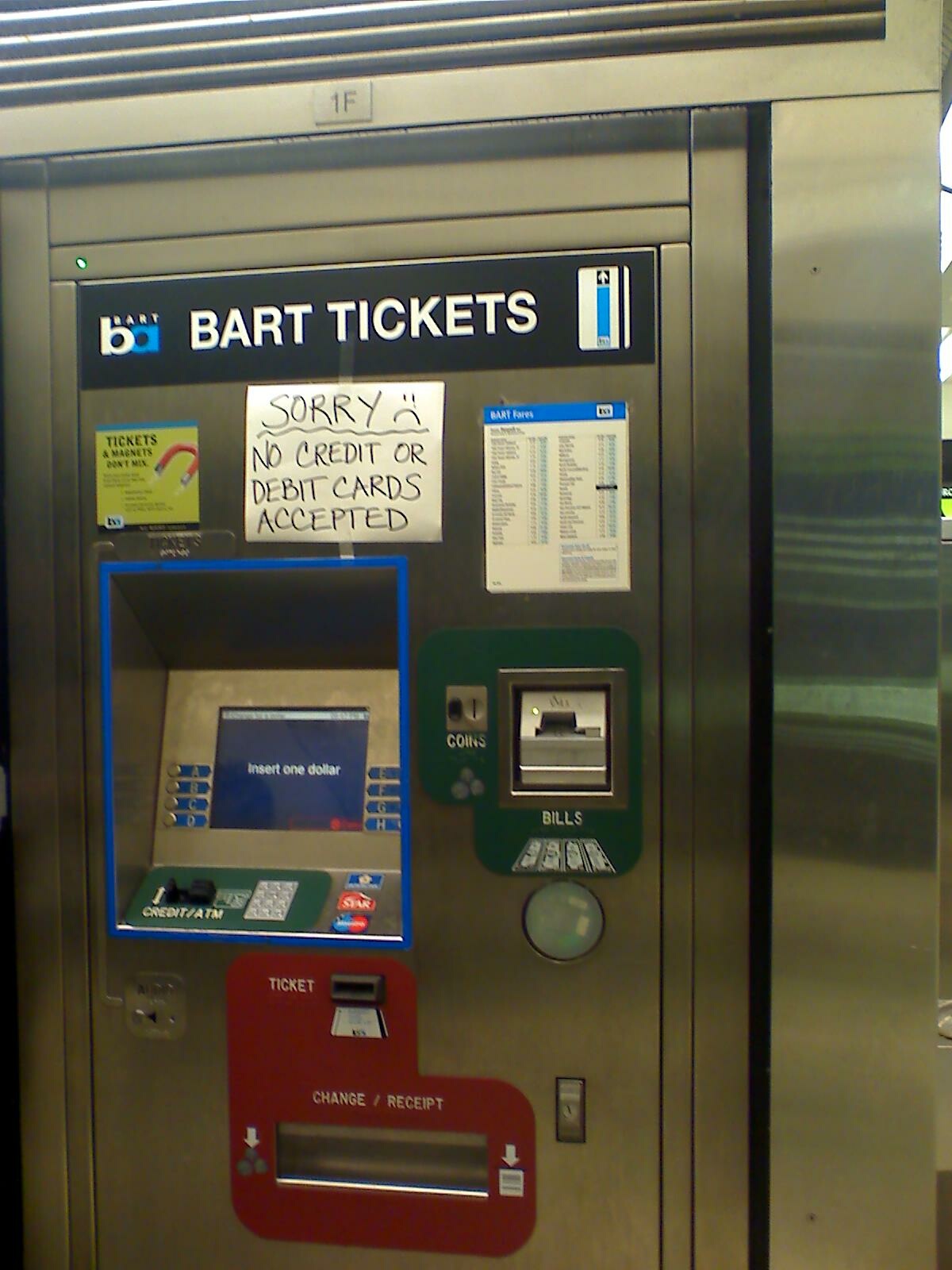 a machine is at the bus station, with tickets