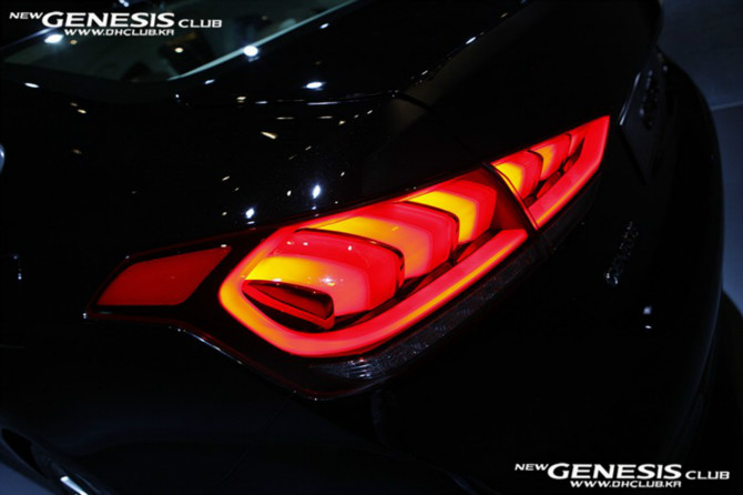 a close up of the tail light on a black car