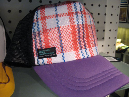 a colorful hat on display for sale at a store