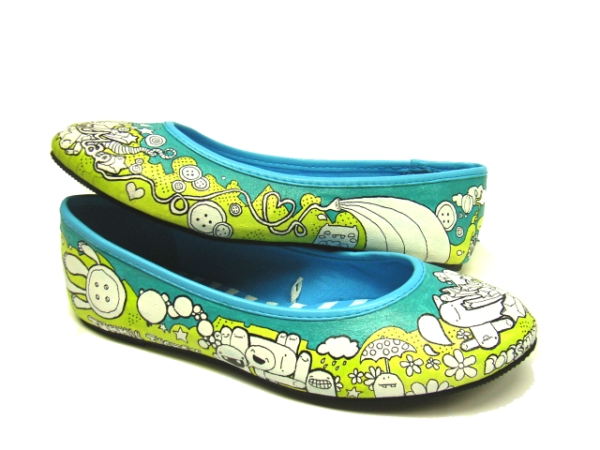 a pair of shoes painted with the cartoon characters