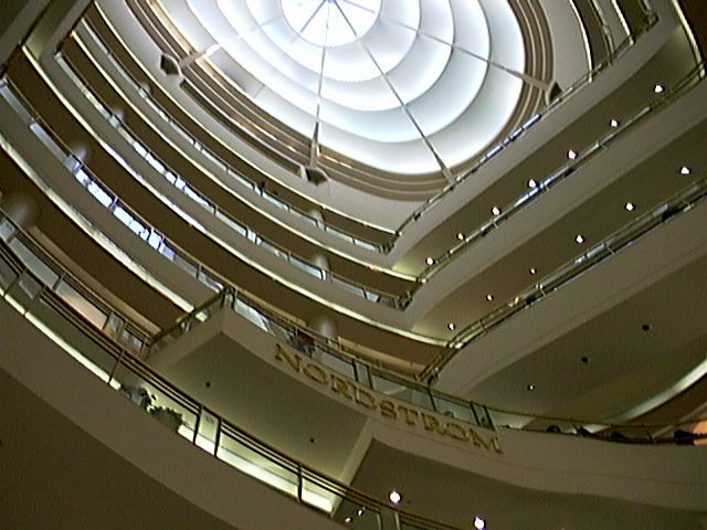 a modern looking building with a circular ceiling