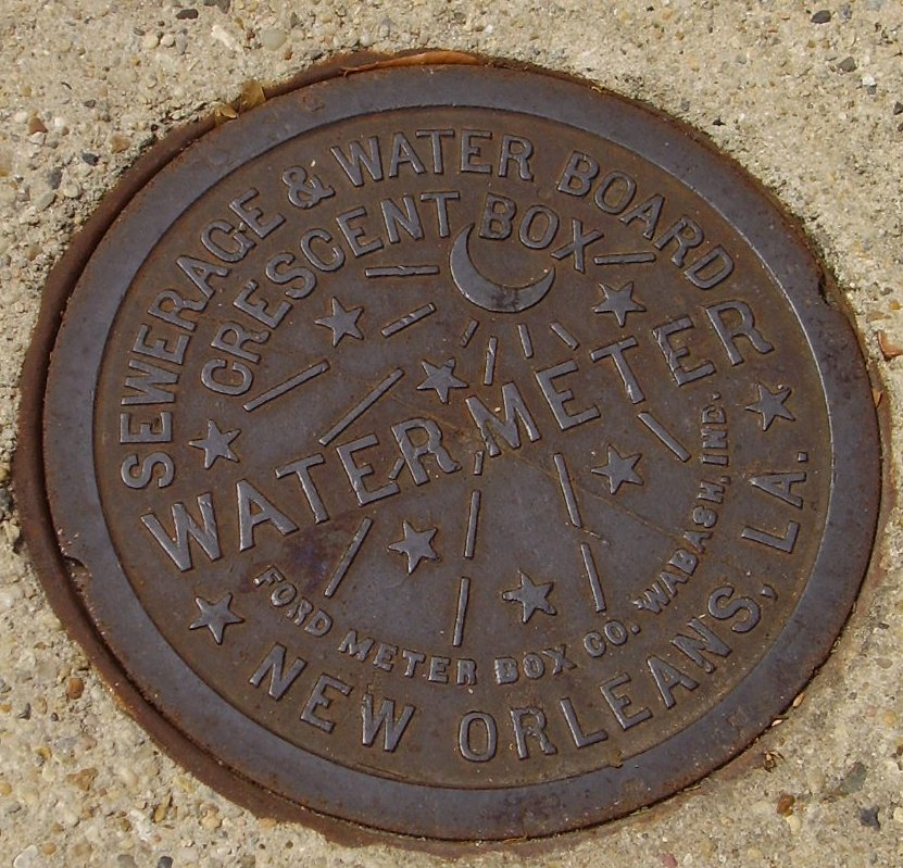 a manhole cover with words on it