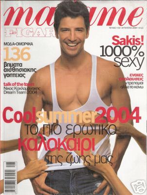 a magazine cover featuring a man smiling for the camera