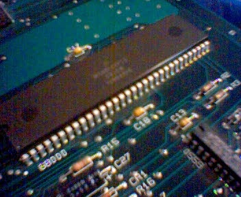 an open circuit board with several lights on