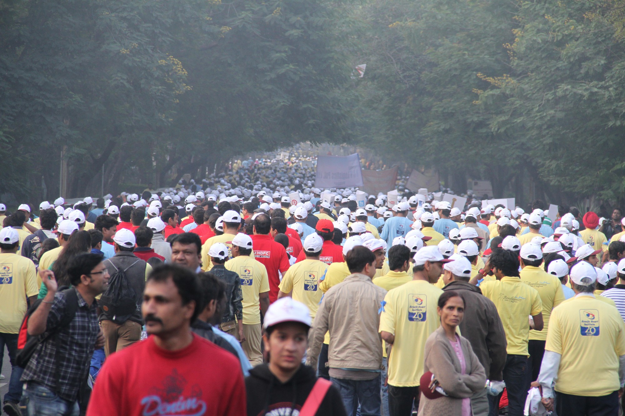 a large group of people wearing hats and t - shirts