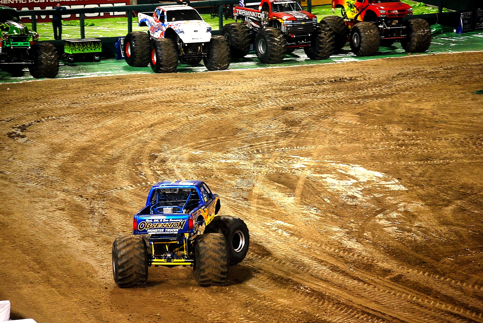 a race buggy races through the dirt during the night