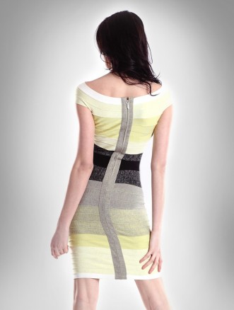 the woman is in a dress with yellow and black stripes