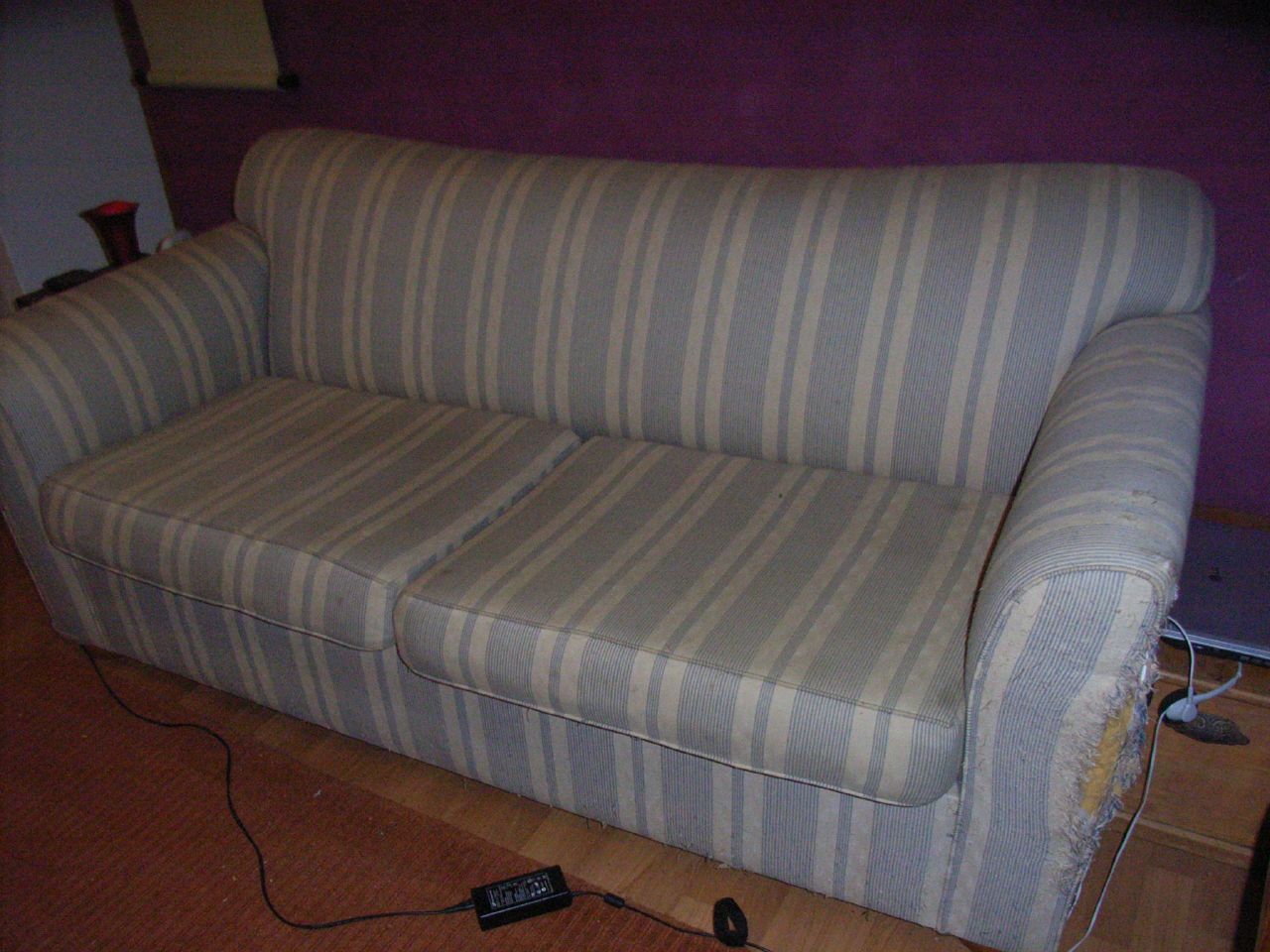 the couch is hooked up to a television remote control