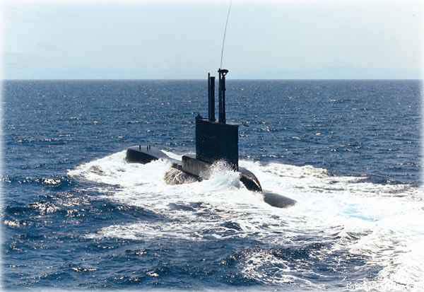 a submarine in the ocean with water splashing all around