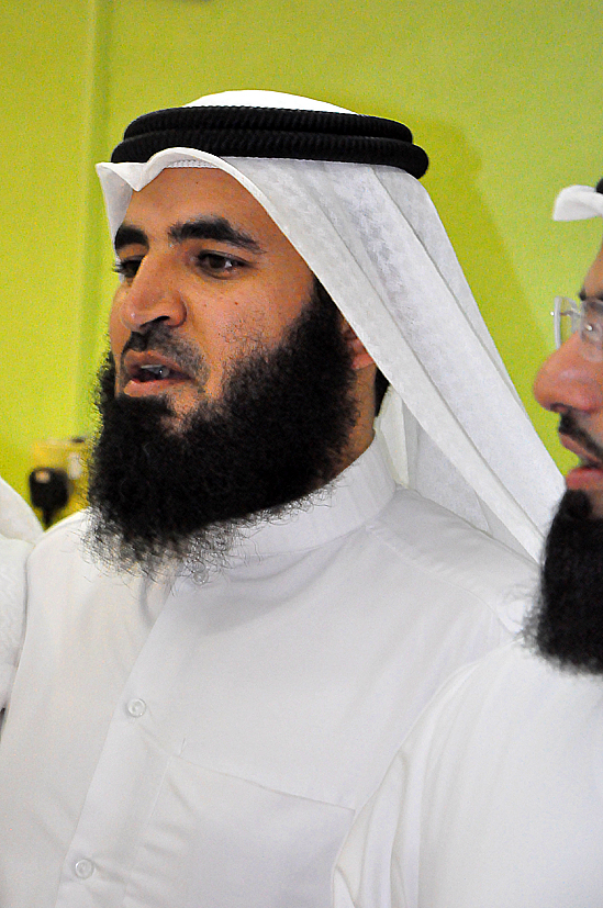 two arab men wearing white are standing together