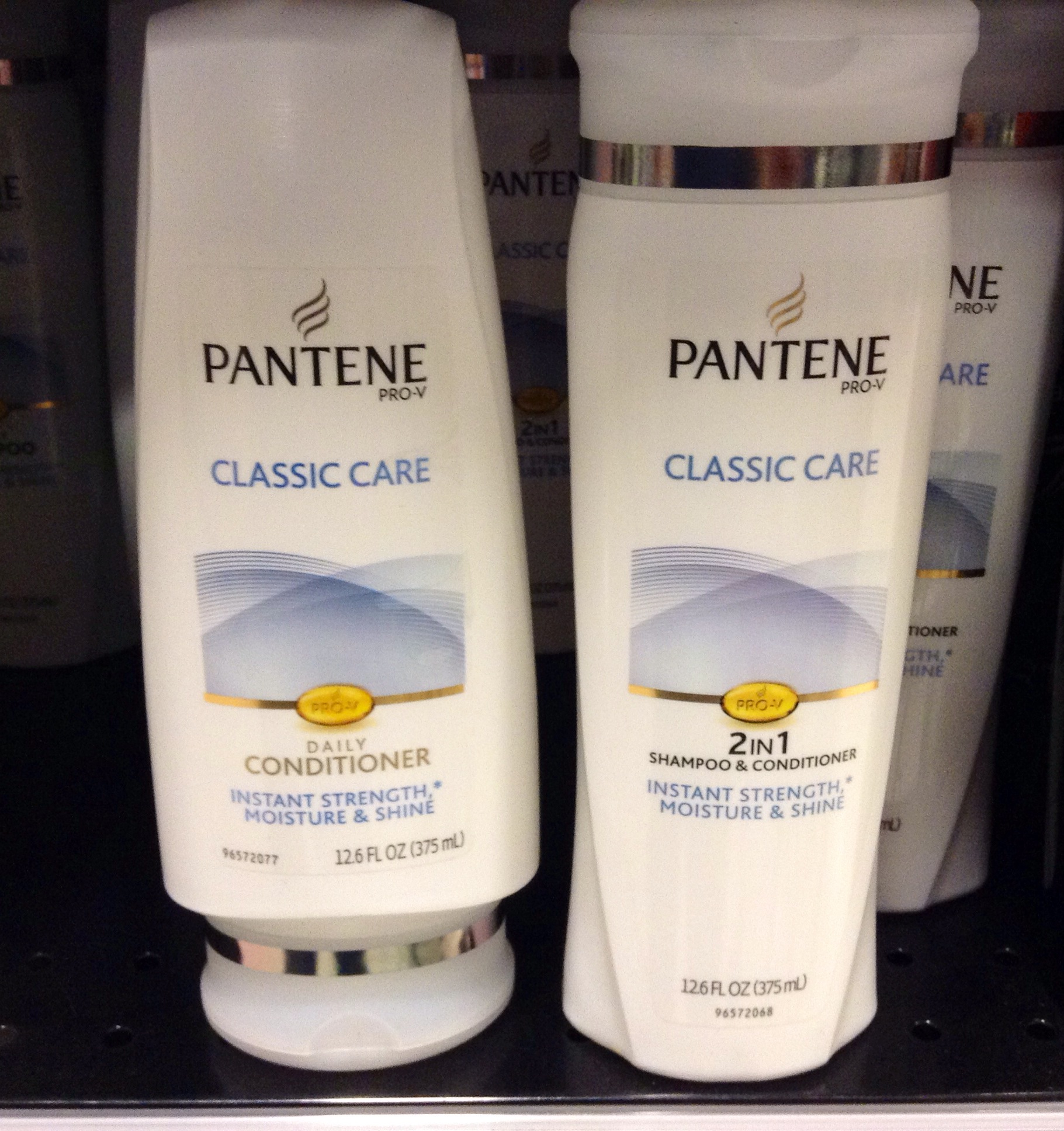 a pair of pantene hair care products on display
