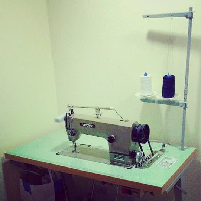 there is a sewing machine on a table