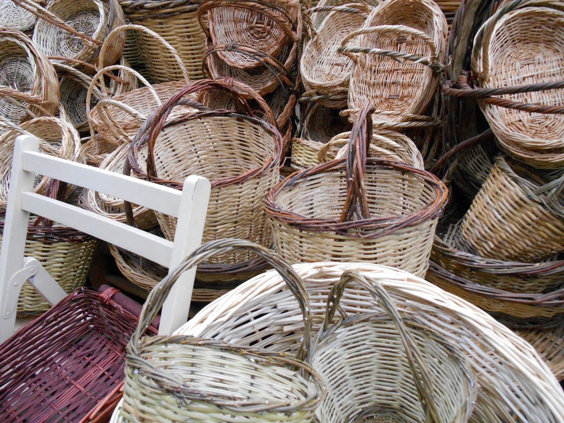 a display of basket baskets that are different sizes