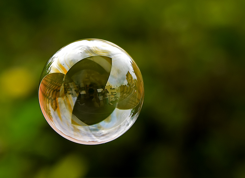 a bubble in the air above the ground