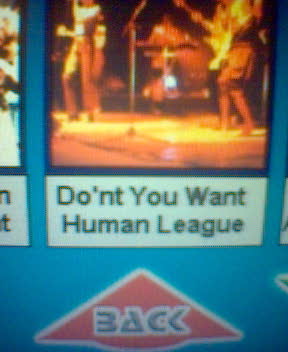 a tv screen with an ad about human league on it
