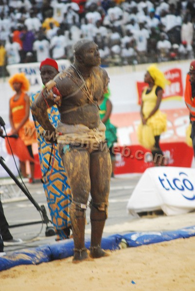 two performers are performing an act in front of a crowd