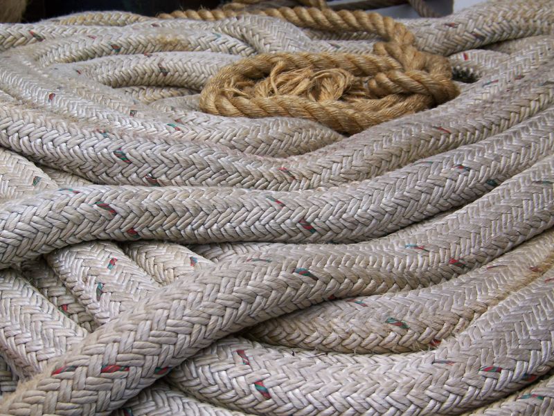 rope laying on top of a boat