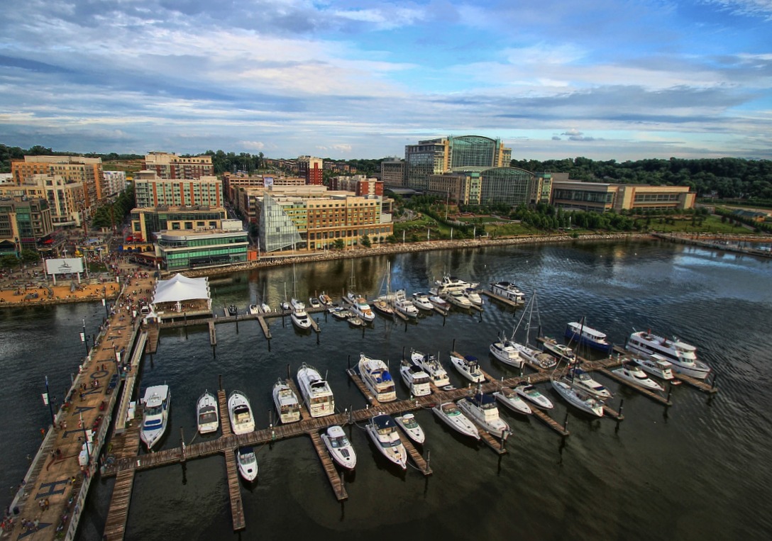 some boats are parked at a marina