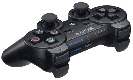 a sony gaming controller with two s