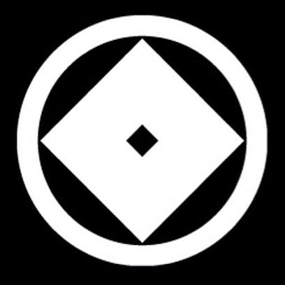 a black and white po of a diamond inside the center of a circle