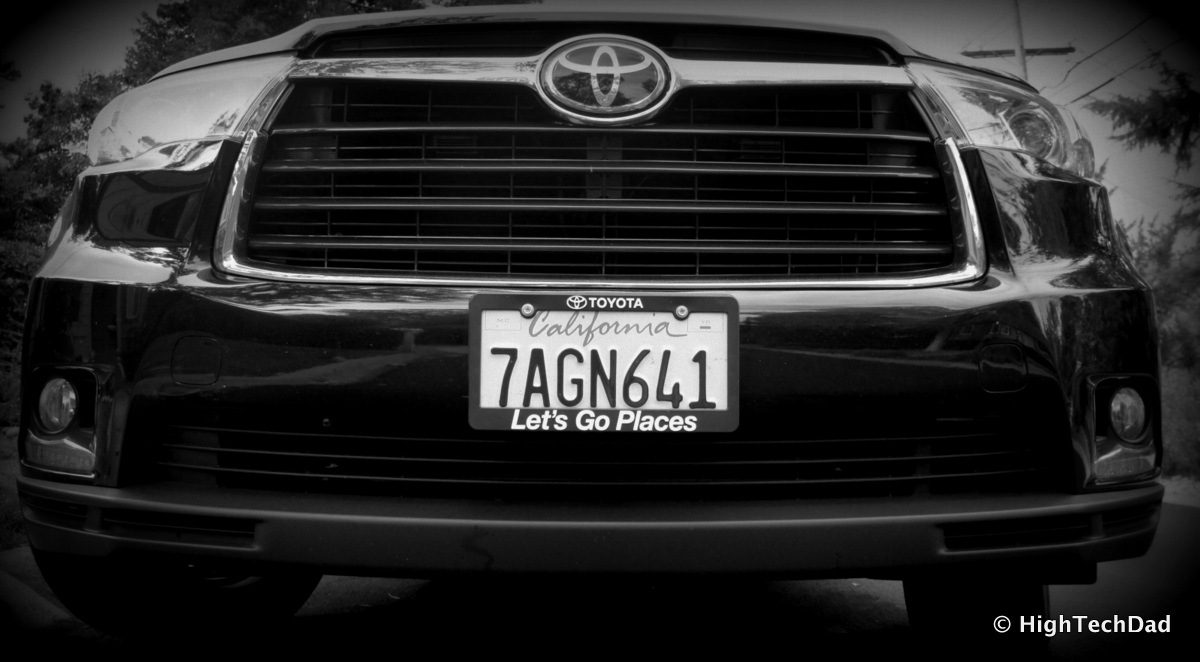 the license plate on the front of a black toyota vehicle