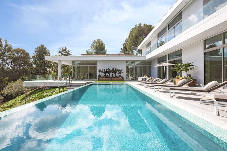 a large house that looks like it has an pool