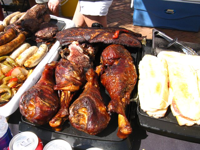 there are several sausages on display in the trays